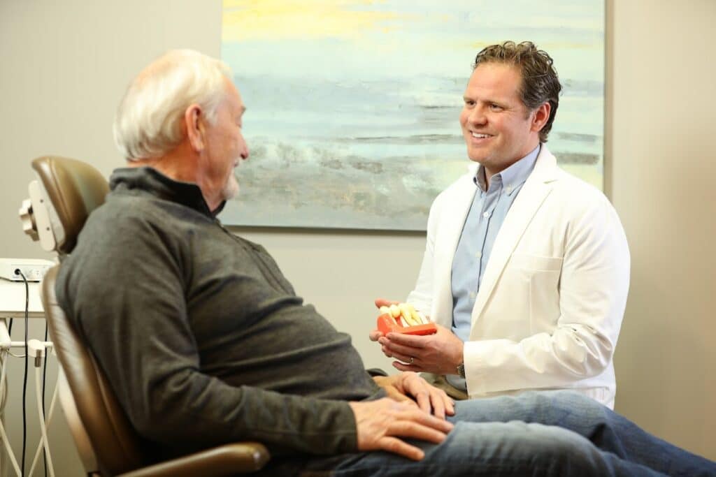 Dr Eric Jones with patient